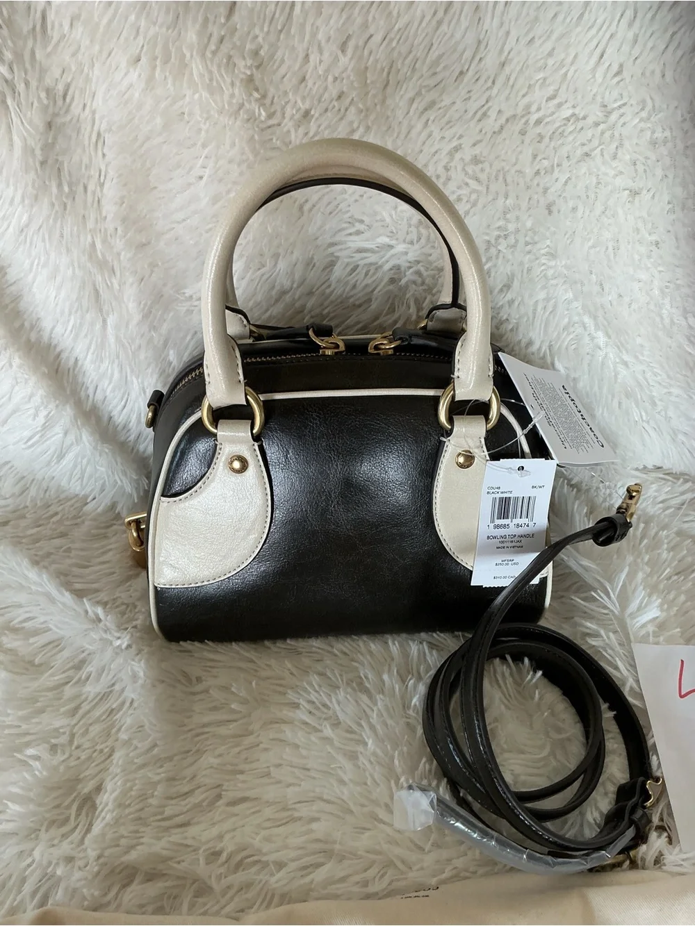 Coach Bowling Top Handle bag in Black and Cream